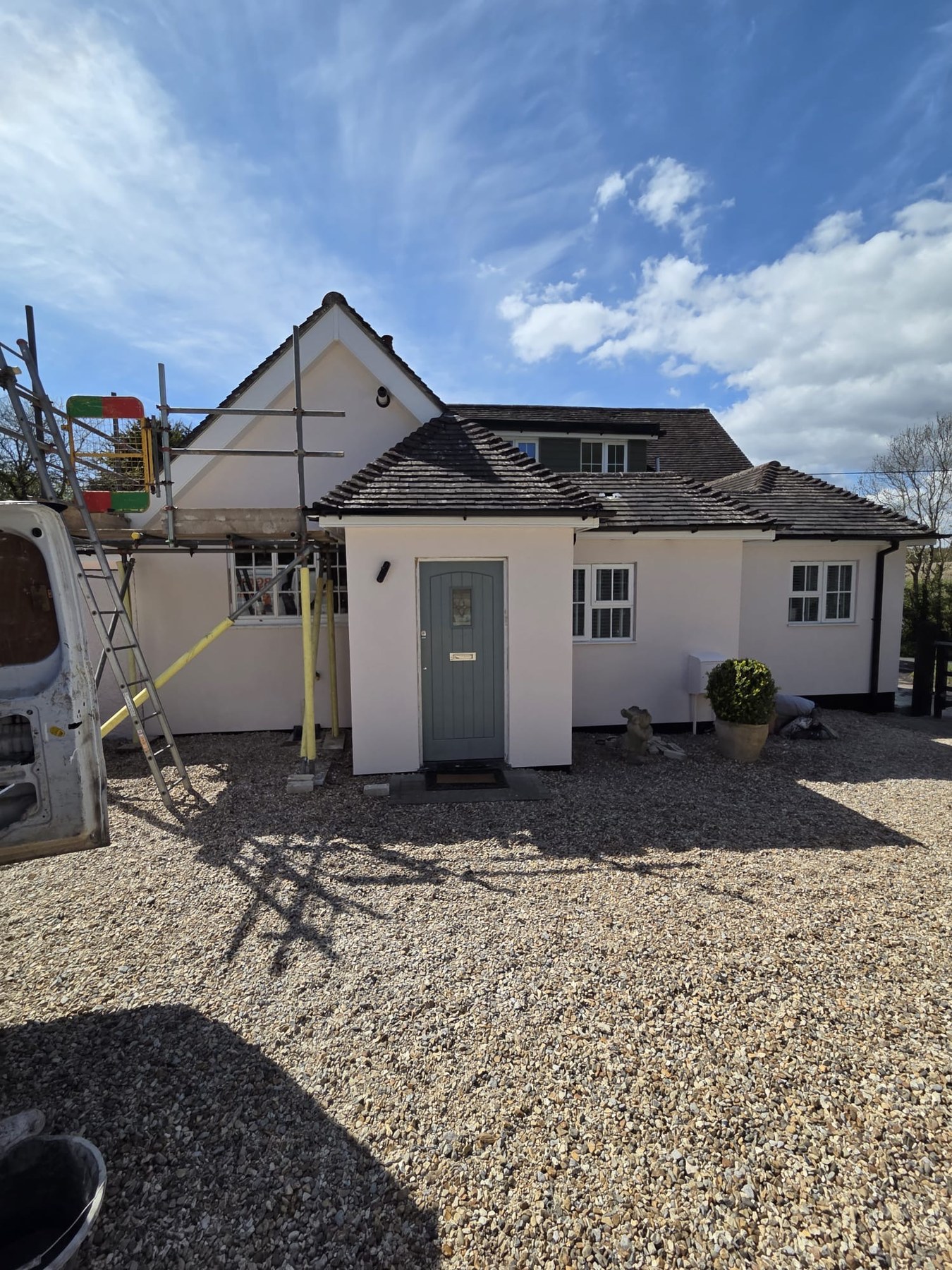 Rendered property exterior with porch detail